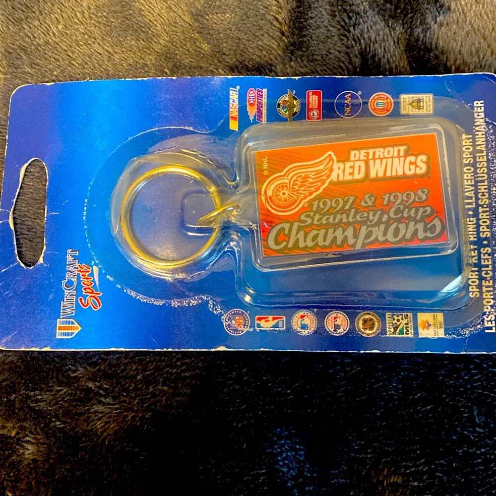 This is a Vintage Detroit Red Wings keychain